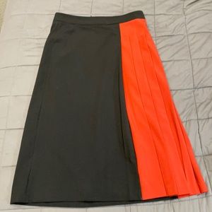 midi skirt - colorblock orange and black pleats!